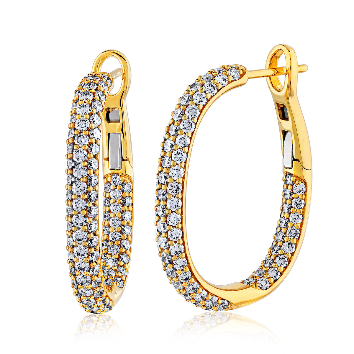 New softly shaped diamond earrings, very wearable. Simple and elegant.