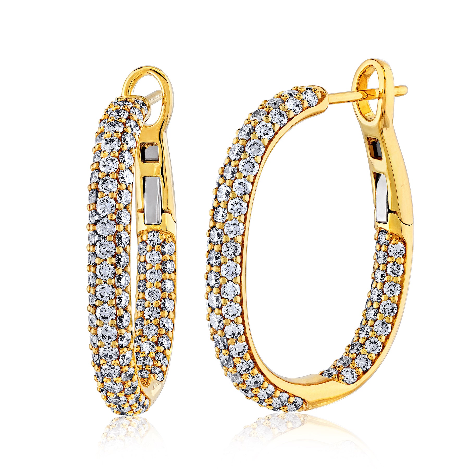 New softly shaped diamond earrings, very wearable. Simple and elegant.